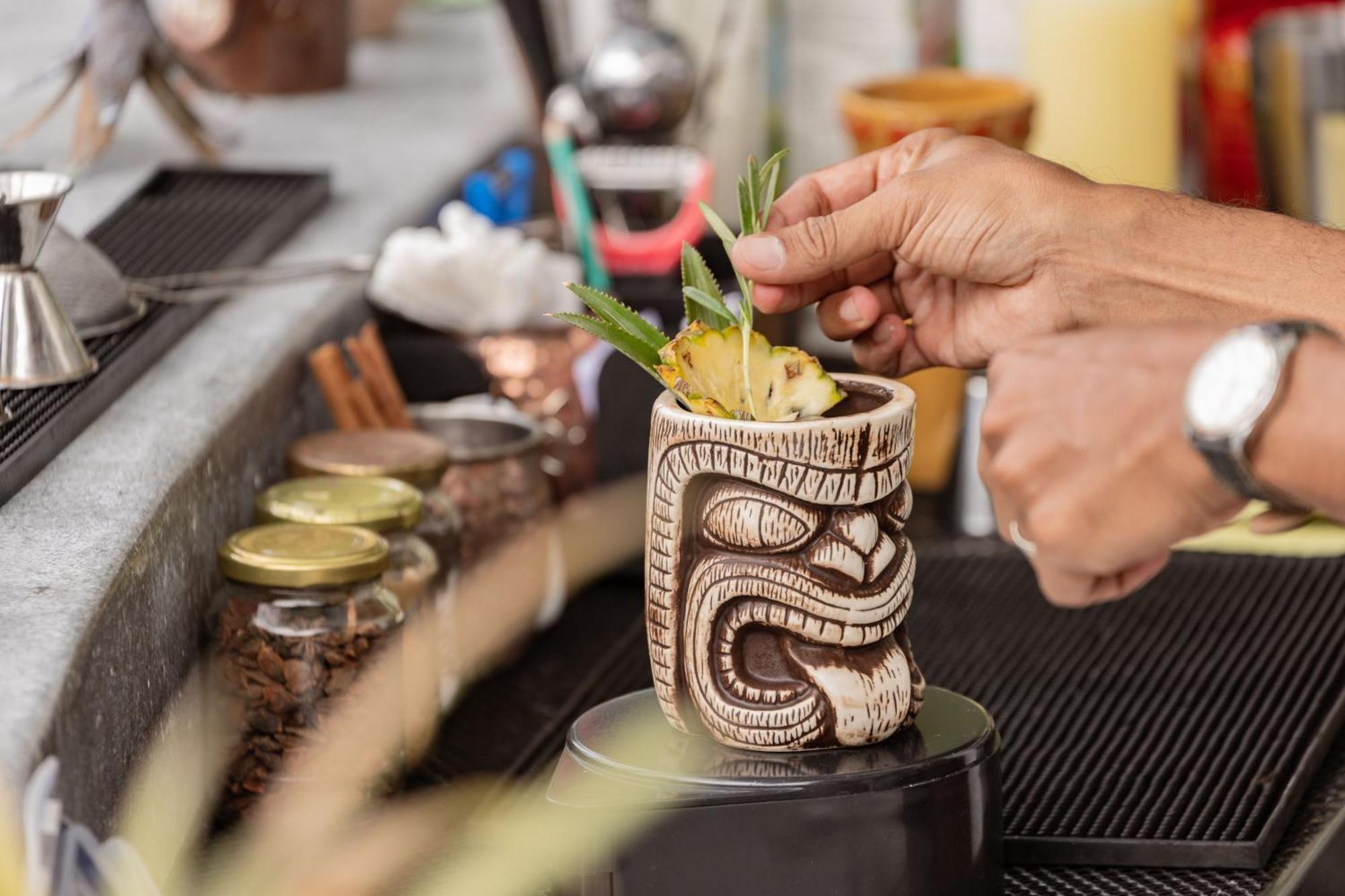 Skyview Resort Phuket Patong Beach Екстер'єр фото A tiki drink being garnished